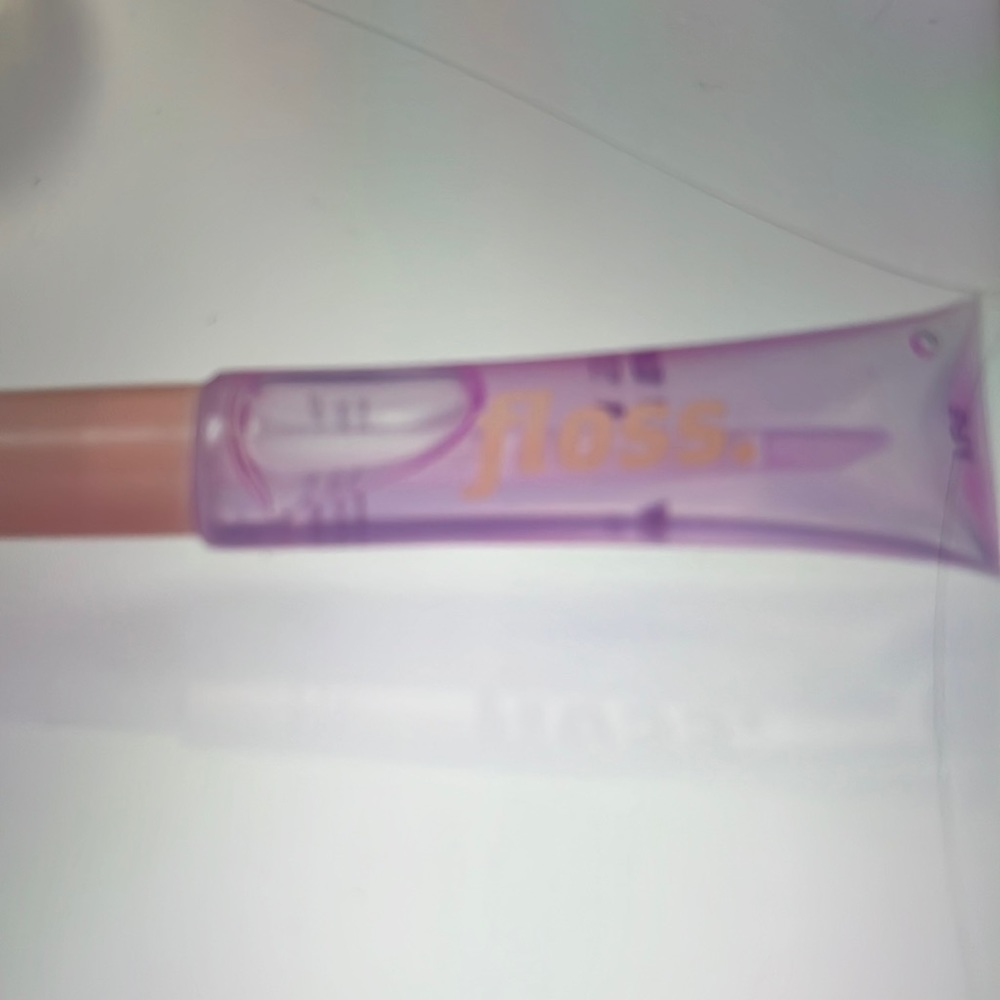 Floss  lip gloss YUL